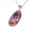 Cacoxenite in Amethyst Pendant